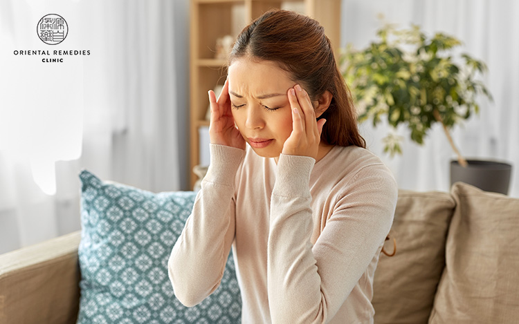 Lady with headache